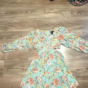 Long sleeve floral dress with side cut outs